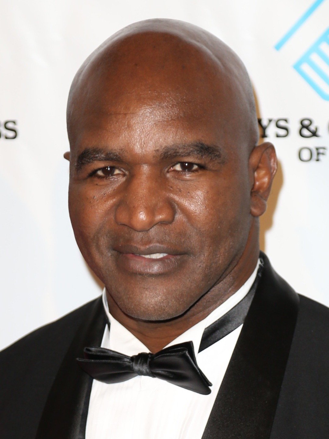 How tall is Evander Holyfield?